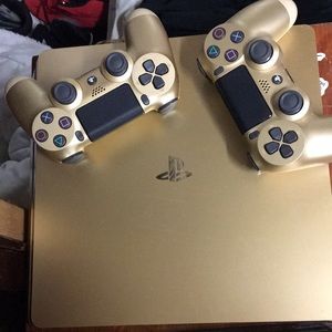 A gold edition PS4 with 2 controllers